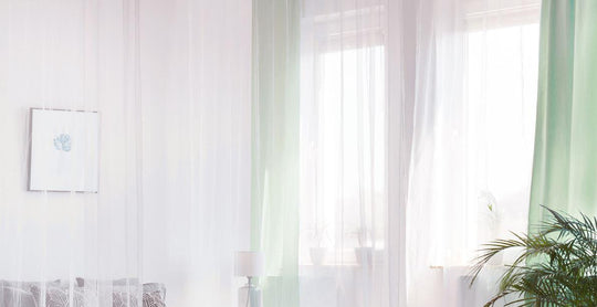 sheer curtains over bright window